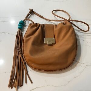 Jimmy Choo tan leather cross body saddle bag with turquoise tassel